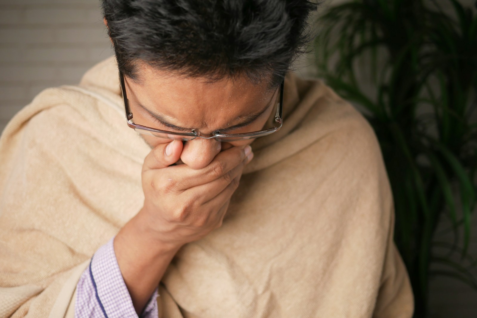 Photo by Towfiqu barbhuiya man in brown sweater wearing black framed eyeglasses